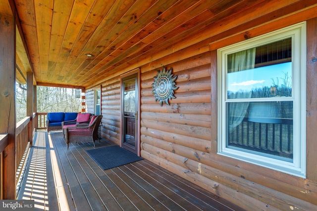 wooden deck featuring covered porch