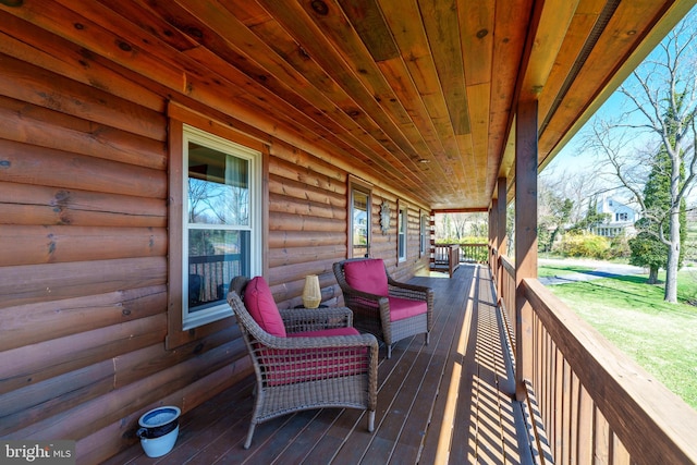 wooden deck featuring a porch