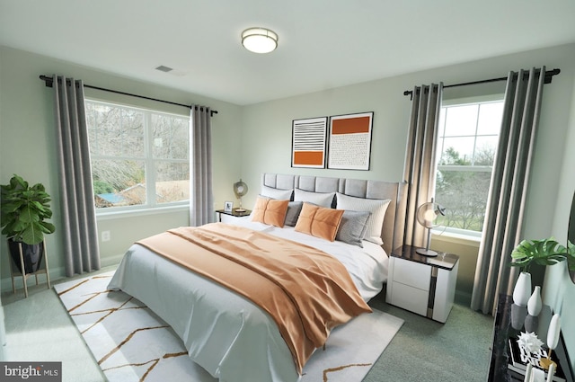 bedroom featuring light carpet