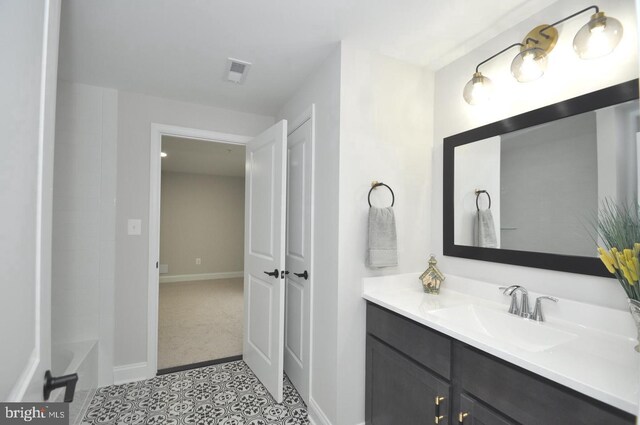 bathroom with tile patterned floors and toilet