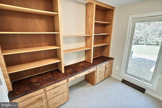 home office featuring light carpet