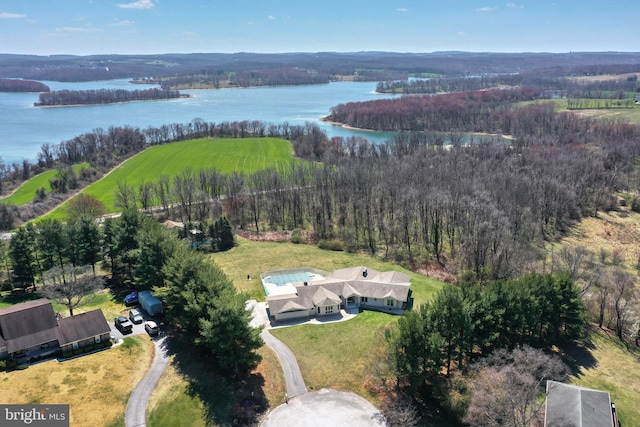 drone / aerial view with a water view