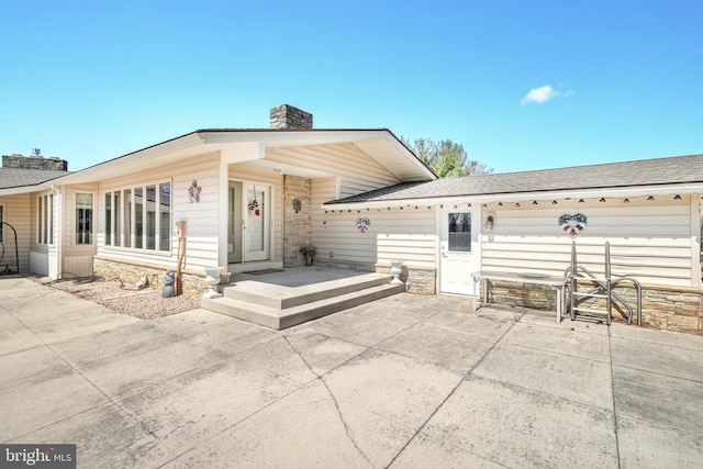 view of front of house featuring a patio