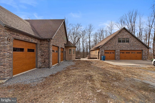 view of property exterior featuring a garage