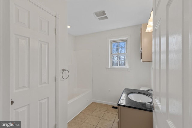 bathroom featuring tile flooring, vanity, and shower / tub combination