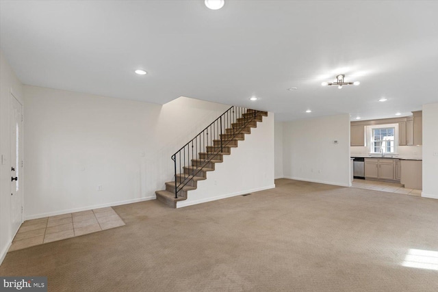 unfurnished living room with light carpet