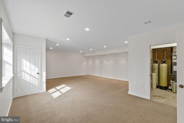 empty room featuring carpet floors