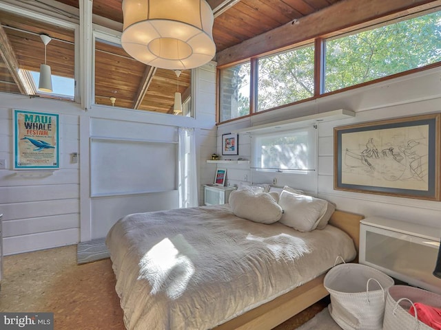23 Jersey St, Dewey Beach, DE 19971 - bedroom with wooden ceiling with exposed beams and wood walls