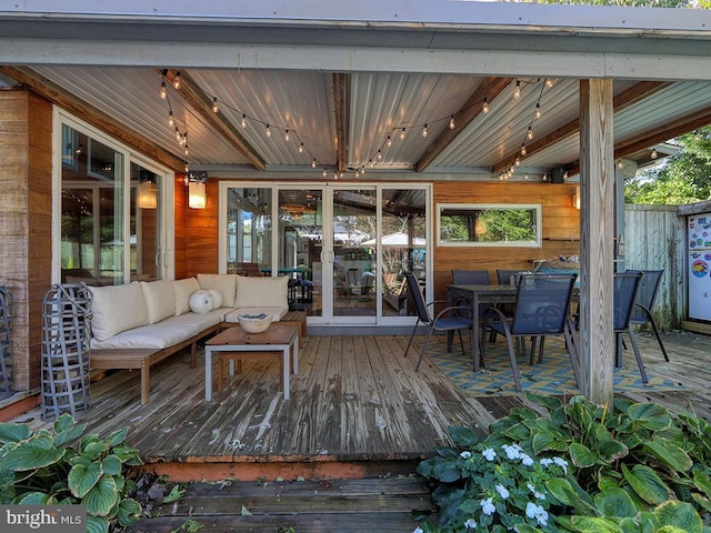 wooden terrace featuring an outdoor hangout area