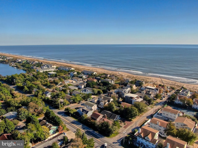 bird's eye view with a view of the beach and a water view