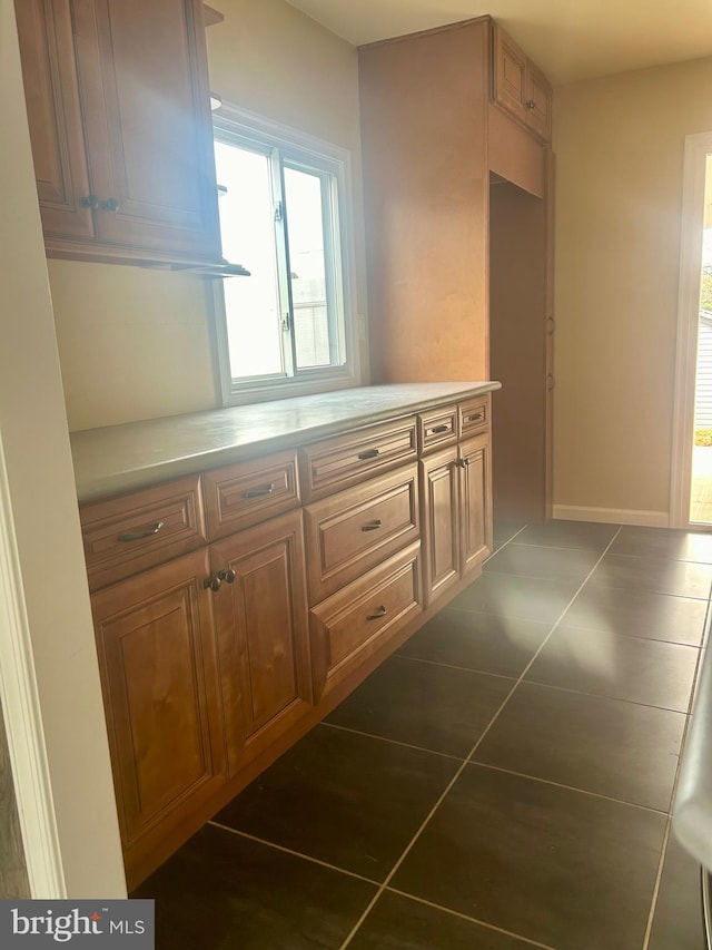 interior space with tile patterned flooring and vanity