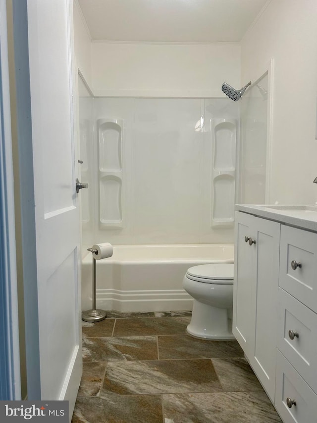 full bathroom featuring shower / tub combination, vanity, and toilet