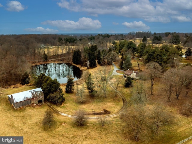 aerial view featuring a rural view and a water view