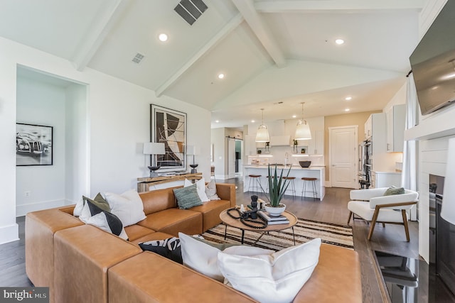 living room featuring high vaulted ceiling, dark hardwood / wood-style floors, and beamed ceiling