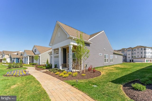 view of front of home featuring a front yard