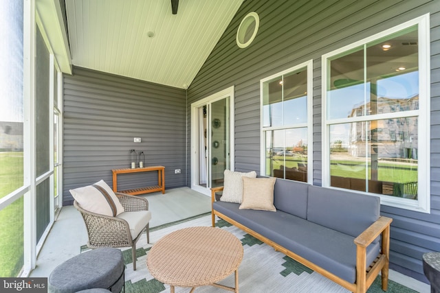 sunroom / solarium with lofted ceiling