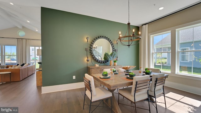 dining space featuring a chandelier, dark hardwood / wood-style flooring, and lofted ceiling with beams