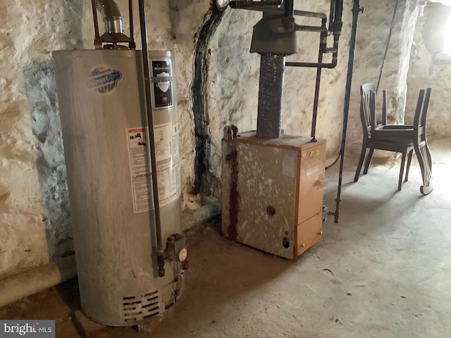 utility room with gas water heater