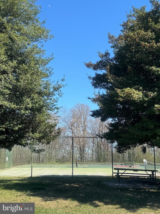 view of home's community featuring a yard