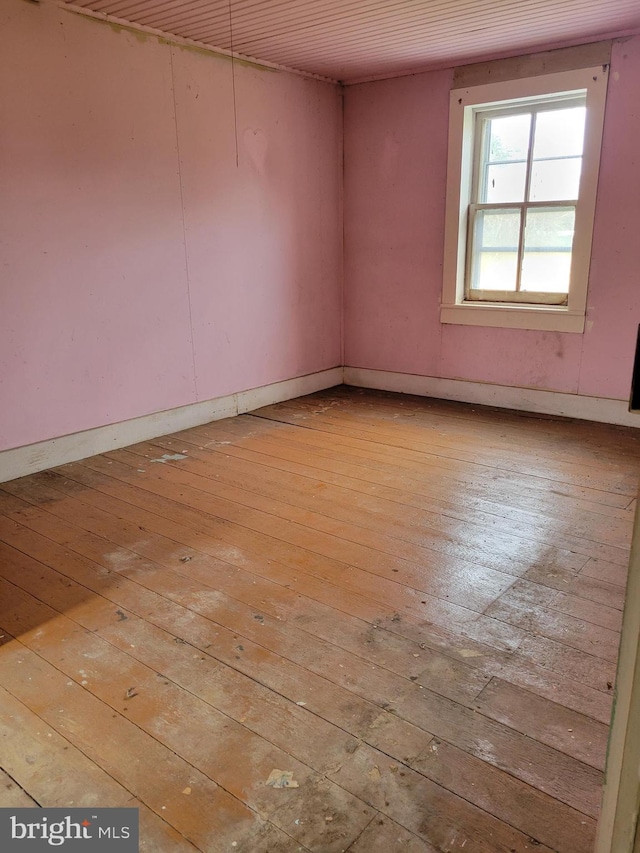 spare room featuring light wood-type flooring