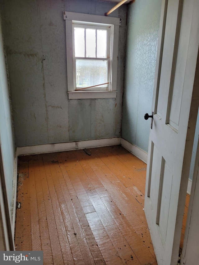 unfurnished room featuring light wood-type flooring