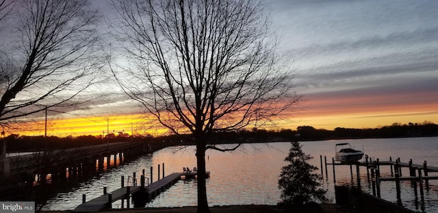 view of dock with a water view