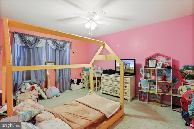 bedroom featuring ceiling fan and carpet flooring