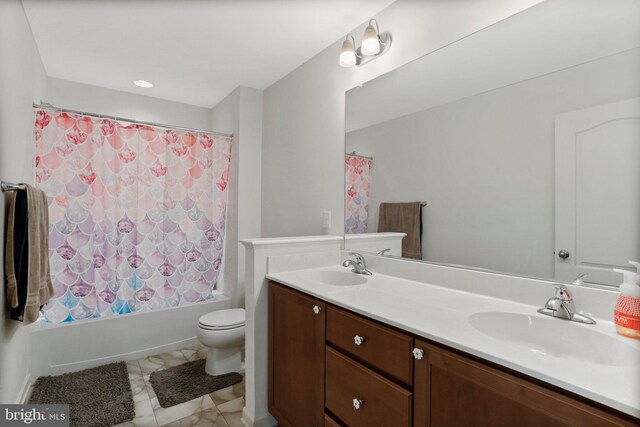 full bathroom featuring double vanity, tile flooring, shower / bath combination with curtain, and toilet