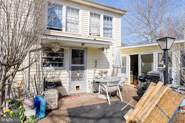 back of property featuring a patio