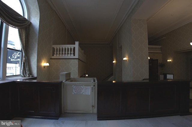 interior space featuring crown molding and tile flooring