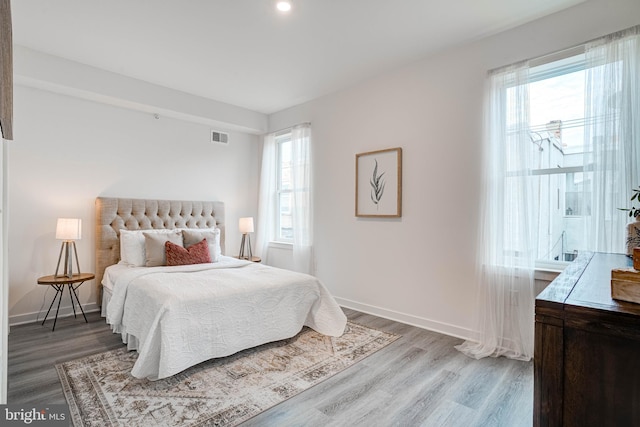 bedroom featuring light hardwood / wood-style flooring