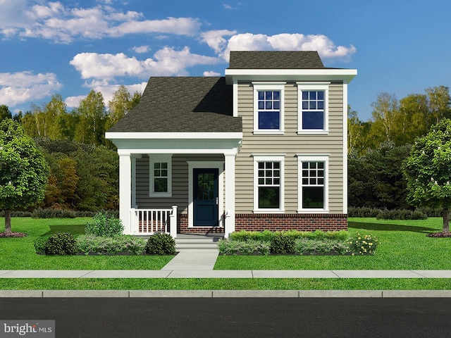 view of front facade with a front yard and a porch