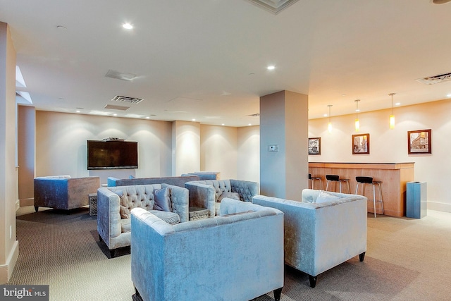 living room with light colored carpet and indoor bar