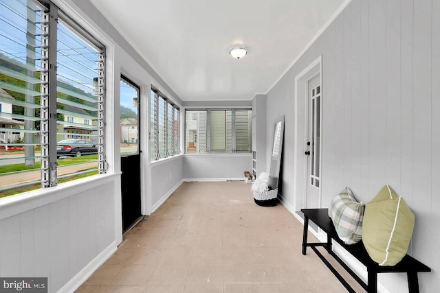 sunroom with plenty of natural light