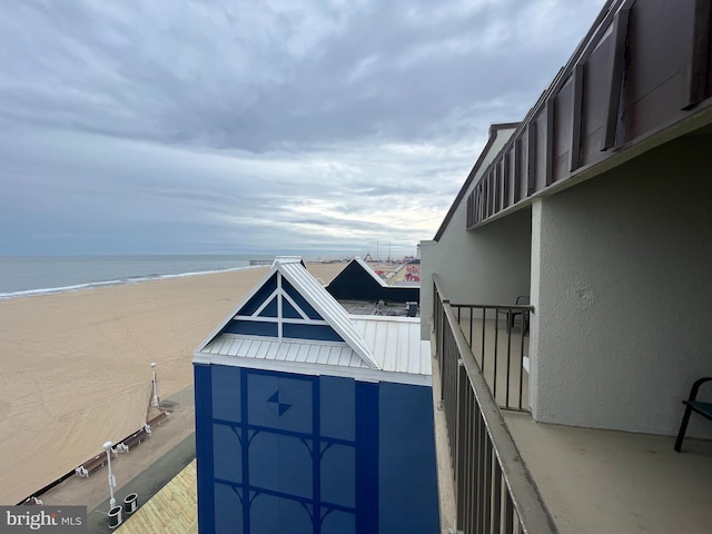 view of water feature with a beach view