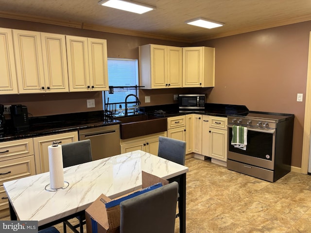 kitchen with sink, appliances with stainless steel finishes, light tile flooring, and crown molding