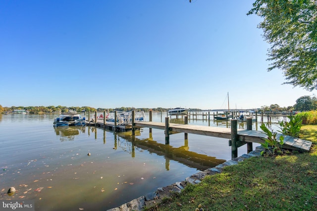 view of dock with a water view