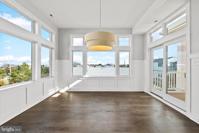 unfurnished sunroom featuring plenty of natural light