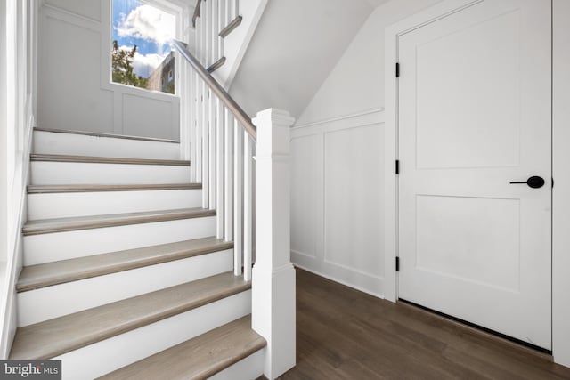 stairs with hardwood / wood-style floors