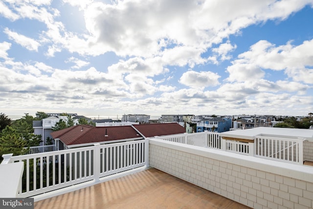 view of patio featuring a balcony