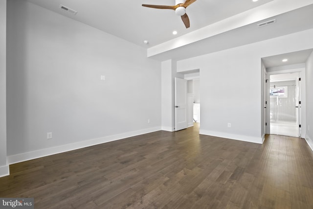 unfurnished room featuring ceiling fan and dark hardwood / wood-style floors