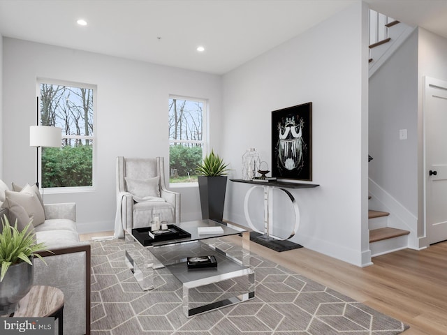 sitting room with light wood-type flooring