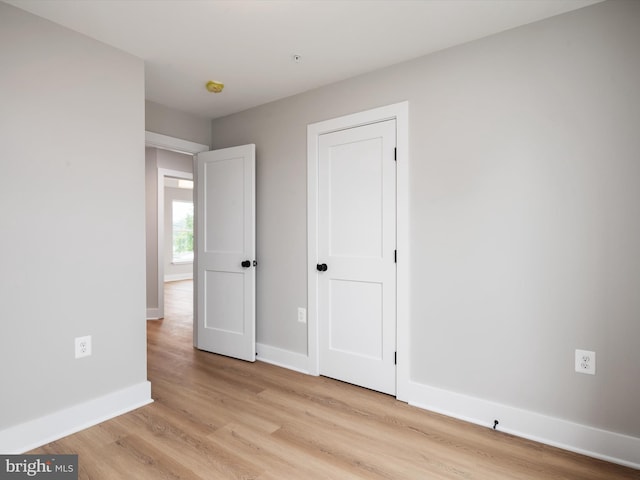 unfurnished bedroom featuring light hardwood / wood-style floors