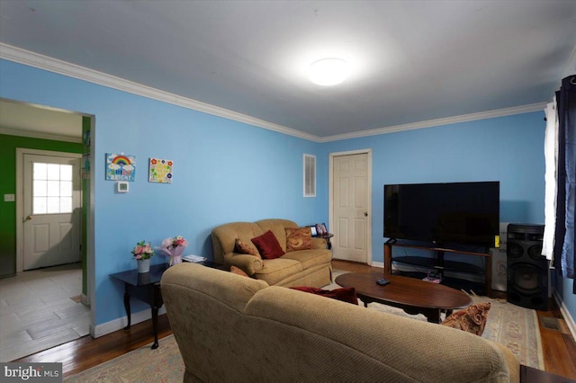 living room featuring light hardwood / wood-style flooring and crown molding