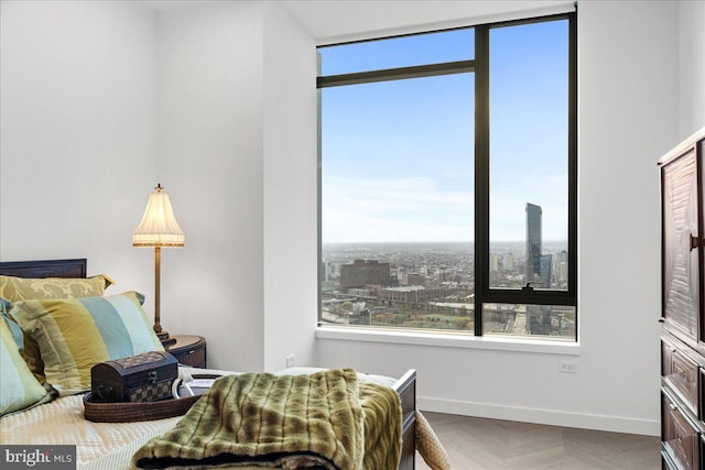 bedroom with light parquet floors