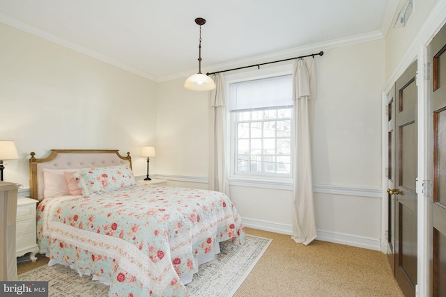 carpeted bedroom with ornamental molding