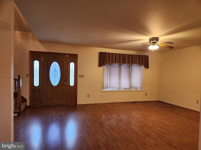 entryway featuring ceiling fan and dark hardwood / wood-style flooring