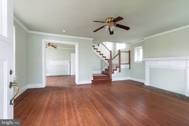 unfurnished living room featuring dark hardwood / wood-style flooring, ceiling fan, and crown molding