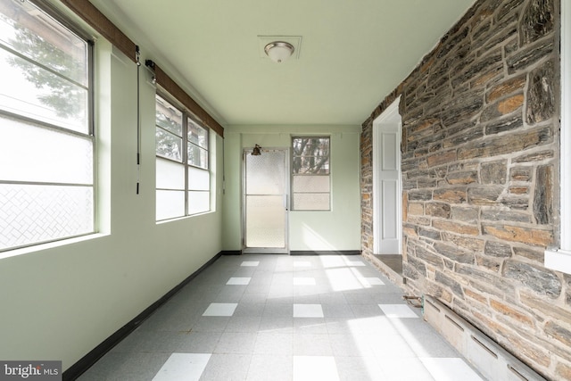 view of unfurnished sunroom