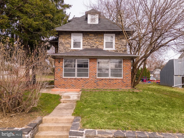 view of front of property with a front lawn